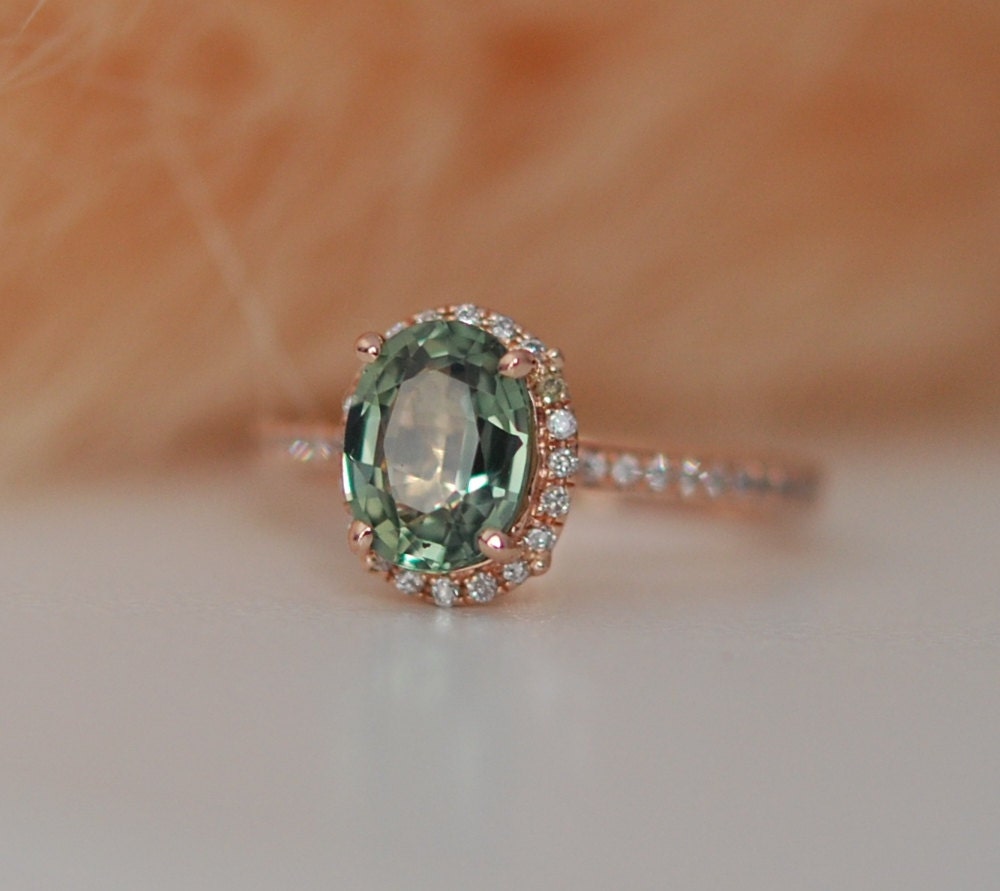 green sapphire engagement rings