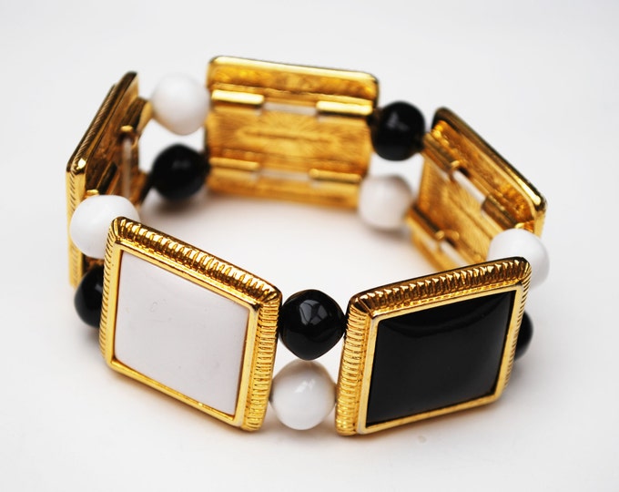 Liz Claiborne Stretch Bracelet with black and white gold panel andbeads