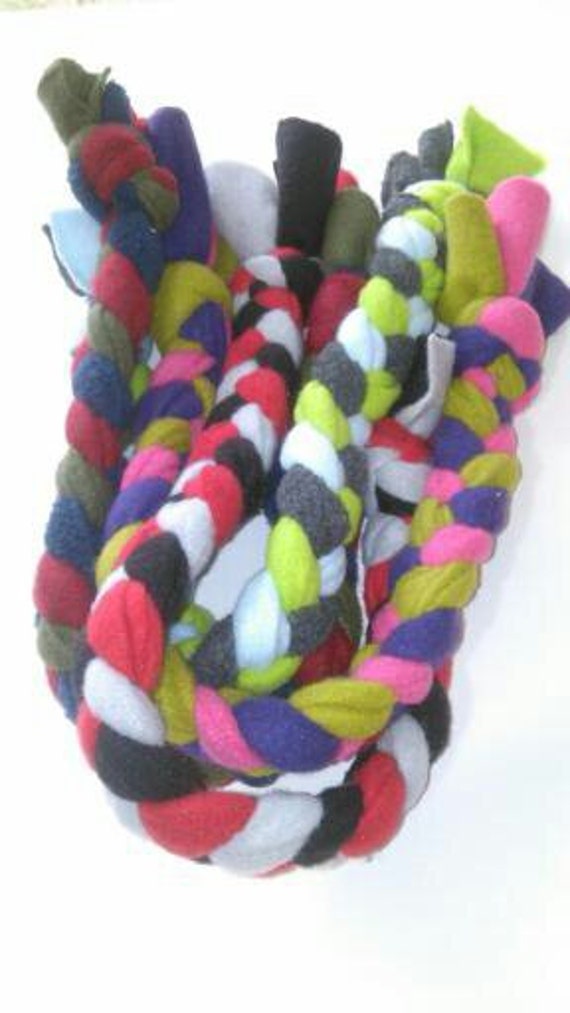 Handmade braided fleece dog rope toys in a variety of colors