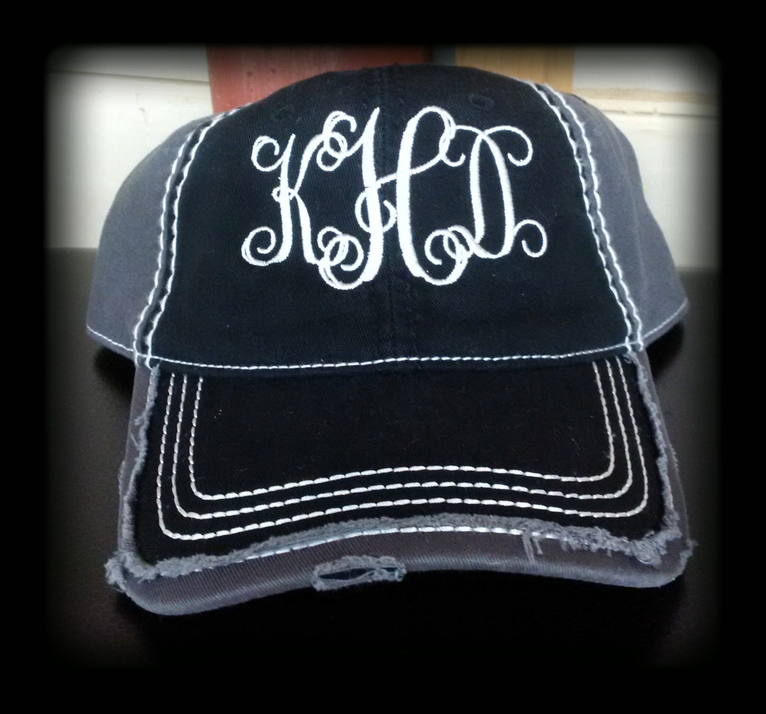 Monogram custom designed embroidered distressed ball cap.
