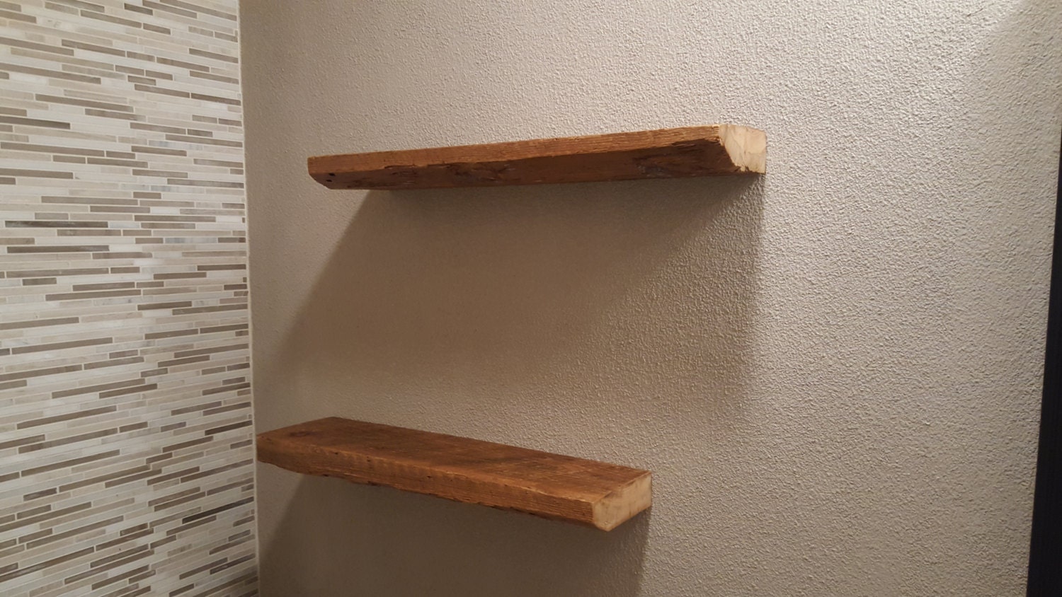 Reclaimed barn wood floating shelves