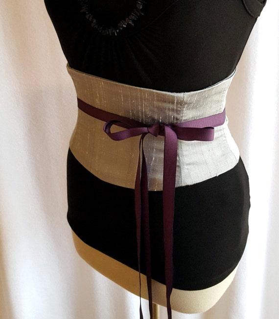 Silver waist belt Sizing. Widths. Our obi belts are sold mostly in 3″ widths with a few 4″ ones because if you are not blessed with a supermodel torso a 3″ will work best and can also be worn lower down i.e. below the waist.