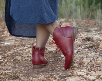 red leather flat boots