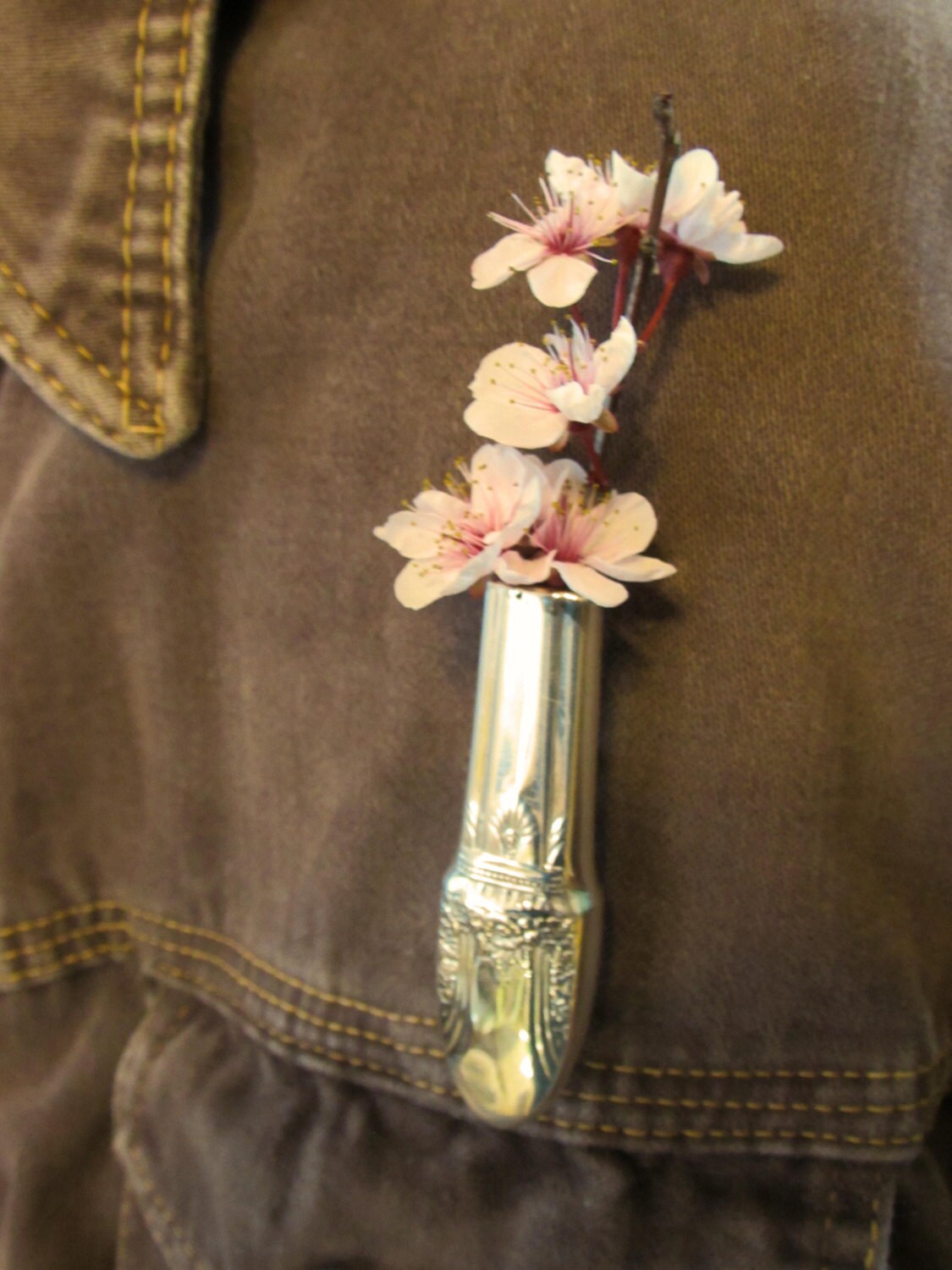 Lapel vase. Lapel pin created from a vintage 'First