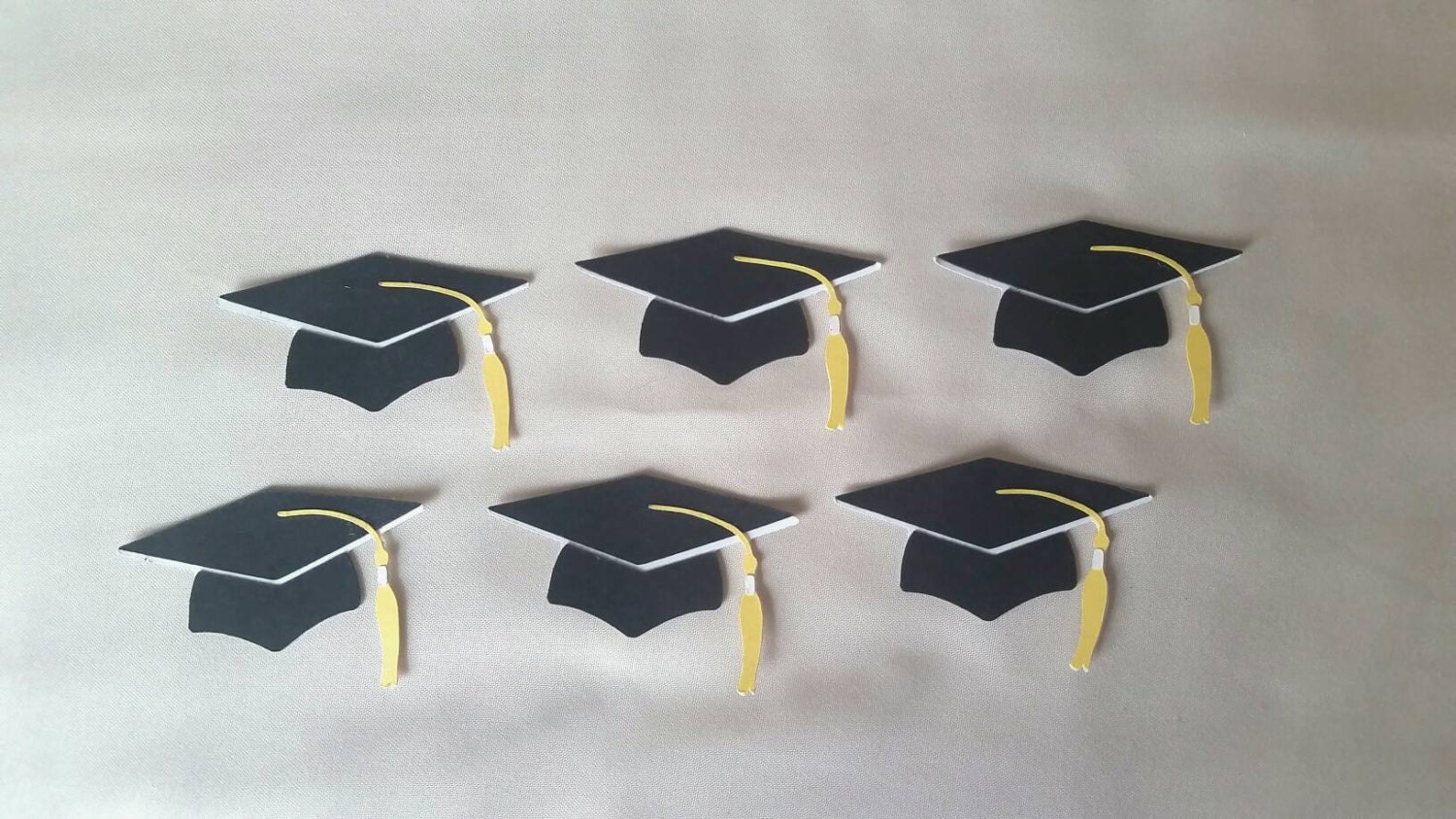 paper cut out graduation caps