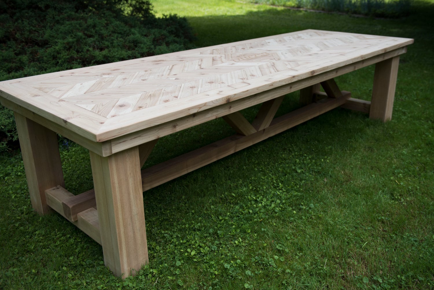 The Samuel Outdoor Cedar Herringbone Dining Table Chevron