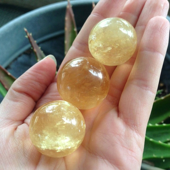 One Honey Calcite Crystal Ball