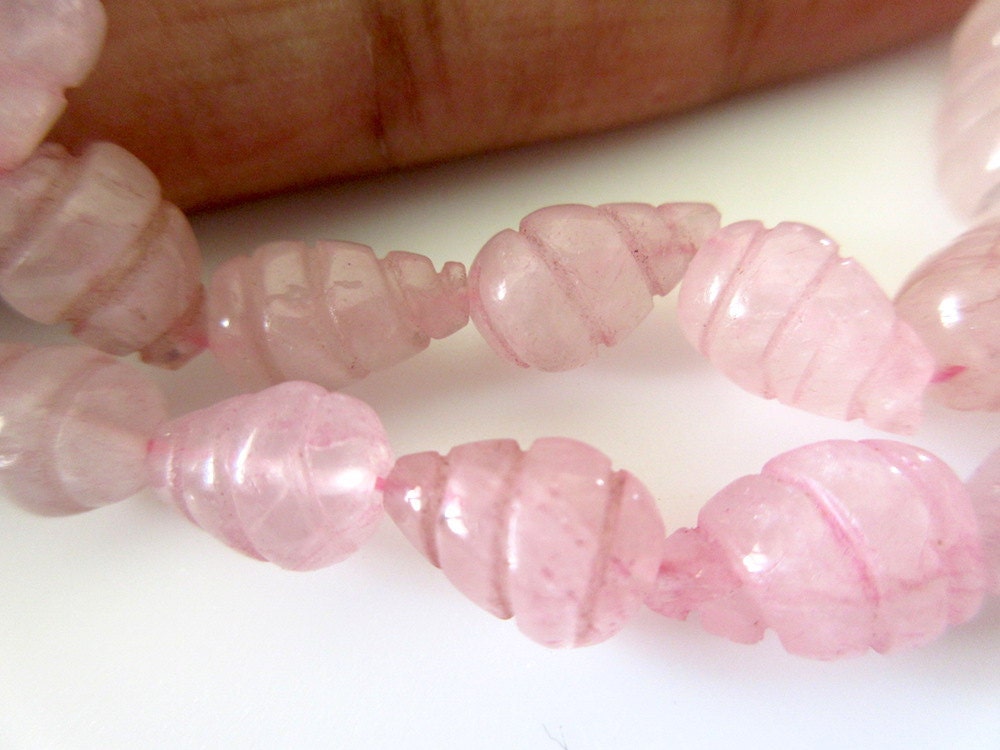 rose quartz beads carved