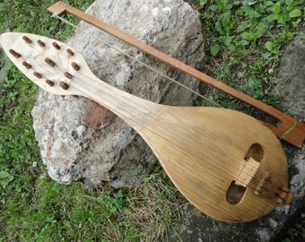 Early antique vintage wooden fiddle violin mandolin musical instrument primitive