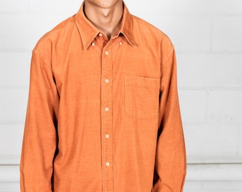 mustard orange shirt