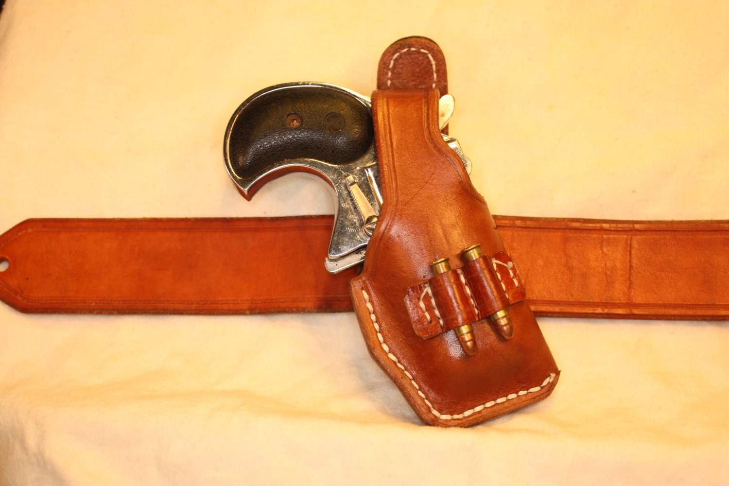 Cross-draw leather holster for Cobra CB22m derringer