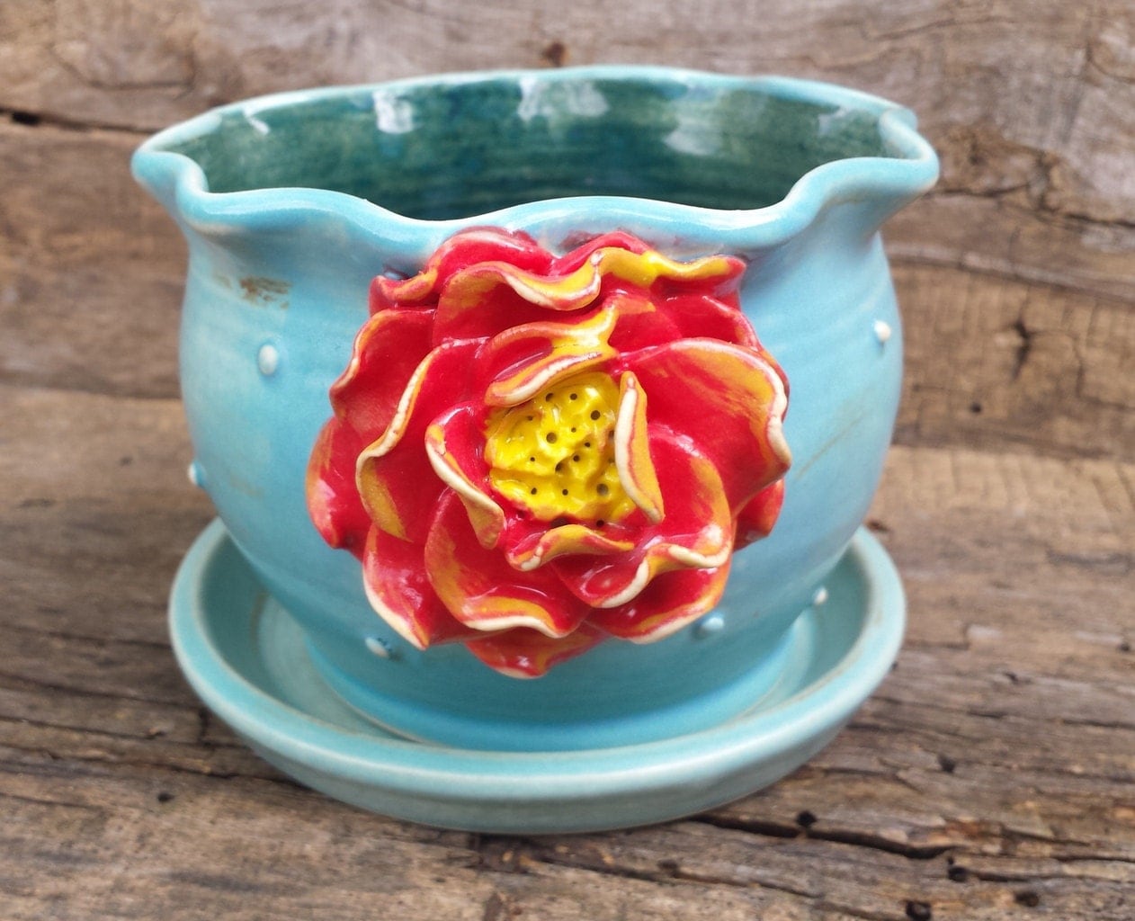  Turquoise  flower  pot  with red rose