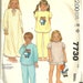 1980s McCalls 7730 Girls Nightgown and Footed Pajamas Pattern Quick and Easy Childs Vintage Sewing Pattern Size Small  Breast 23 25