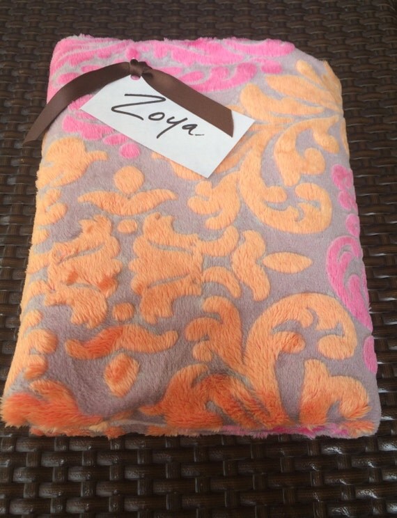 pink and orange throw blanket