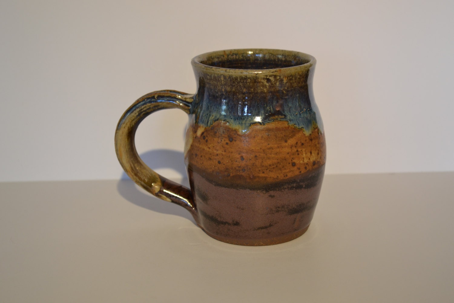Large stoneware coffee or tea mugs.
