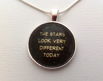 Tribute to David Bowie: "the stars look very different today" Space oddity lyrics under a glass dome- 25mm (1in)