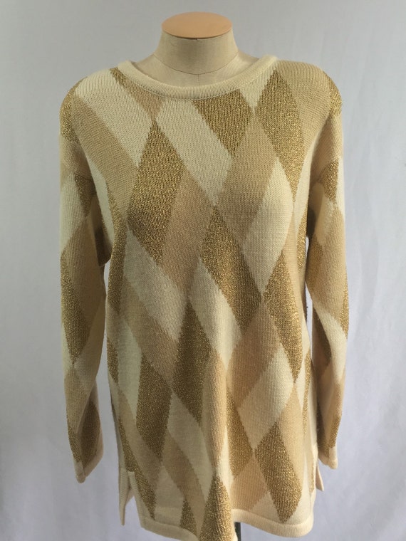 cream and gold sweater