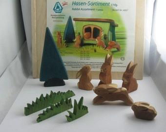 Original OSTHEIMER wooden figures / wood animals (marked). Wooden toys. Rabbit Assortment, 11 pieces, in original packaging. VINTAGE