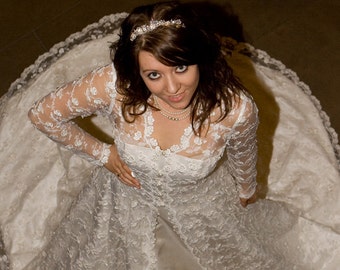 Bridal gown. Glamourous silk satin wedding dress and lace coat.
