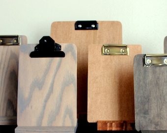 Clipboard stand, for menu board, table numbers, or retail display. Clipboard sold separately.