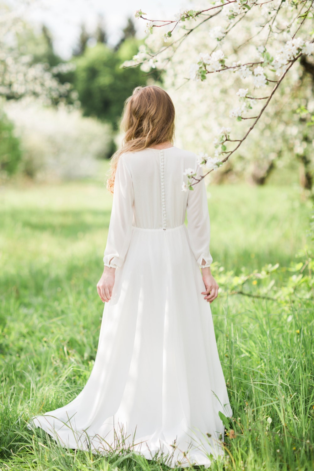 Highnecked milk dress with lavender lace decoration