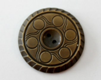 Vintage bronze bakelite button with art deco circle and line design.