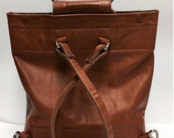 leather one strap backpack