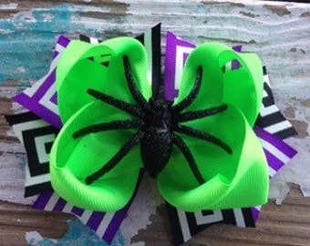 Halloween hair bow topped with a glittery spider!