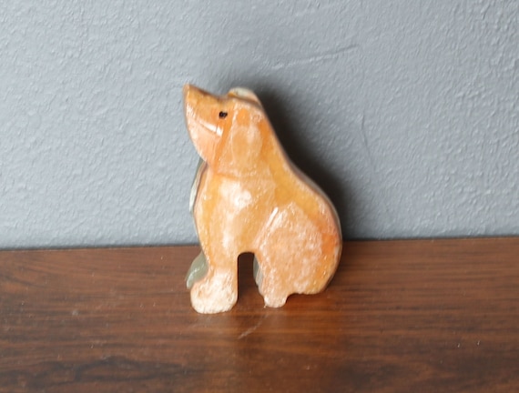 sandstone dog figurines