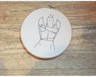 Embroidery the naked woman and rope