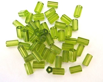 20 Vintage glass beads green, tube,bugle beads faceted, 8mmx6mm