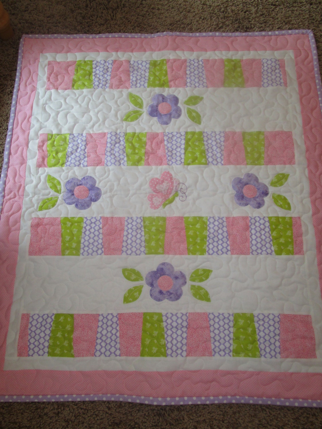 15 CHILD'S QUILTED BLANKET