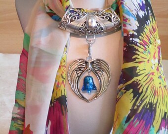 Bijou pour foulard en métal argenté "Un gros coeur en métal argenté avec une clochette en véritable Murano