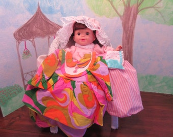 14 inch Baby Doll with 3 outfits