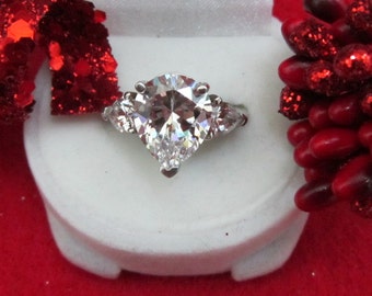 3 Stone Pear Shape Engagement Ring