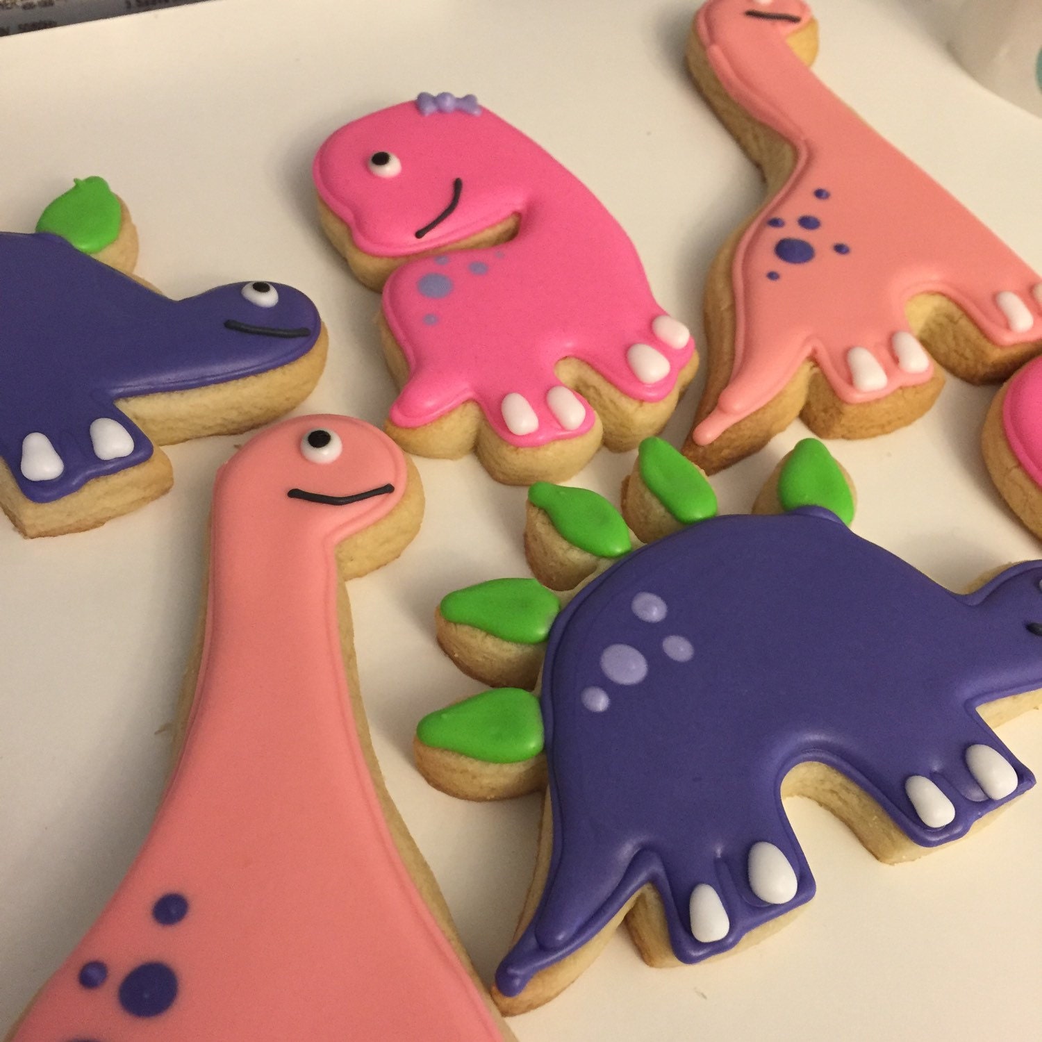 Girly dinosaur cookies by ASweetMorselCo on Etsy