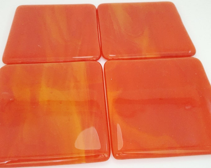 Red and orange fused glass handmade tile coaster set. Tableware. Patio, conservatory. House and home decor. Wedding, housewarming gift.