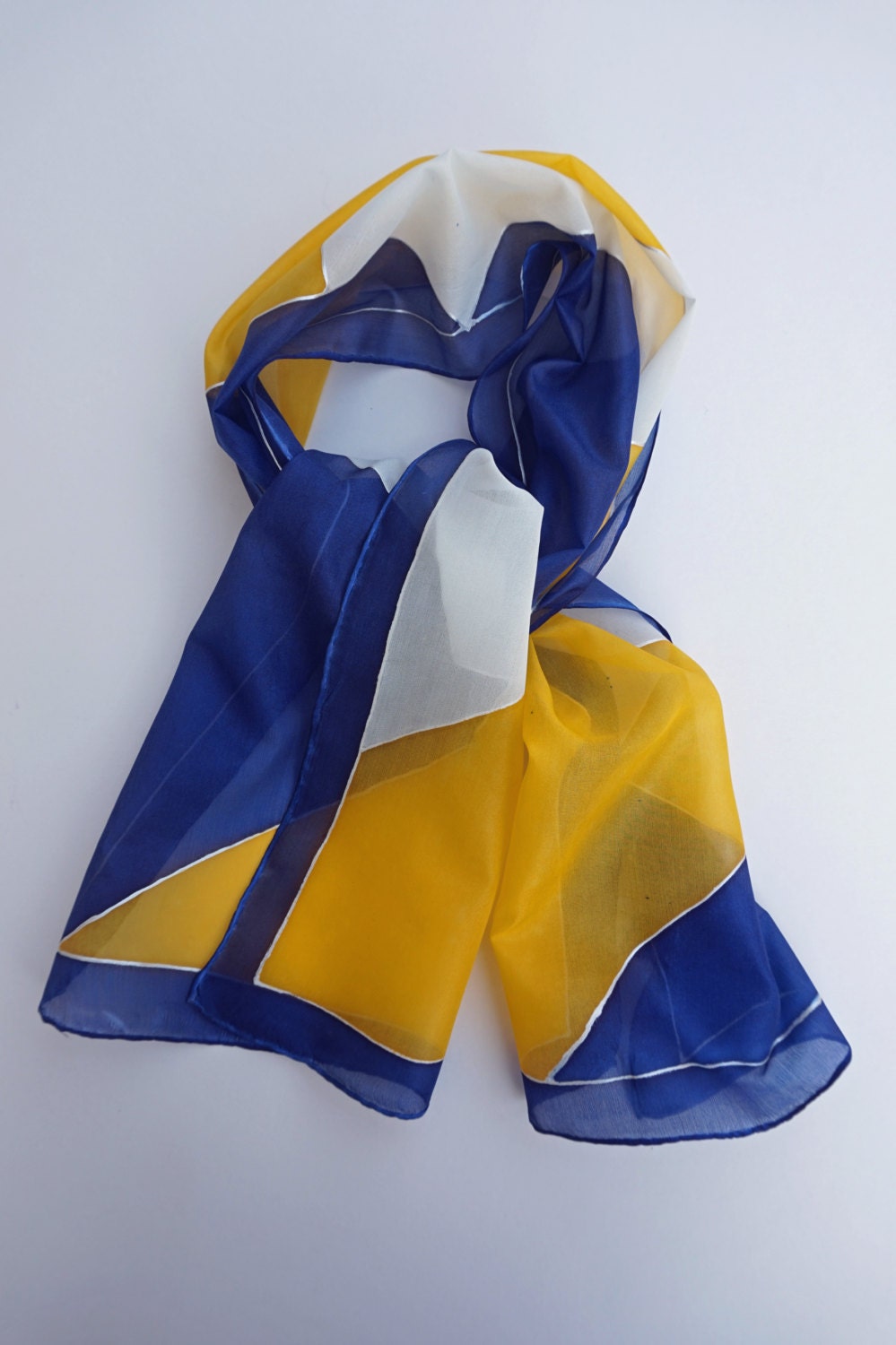 Hand painted silk scarf blue yellow and white geometric