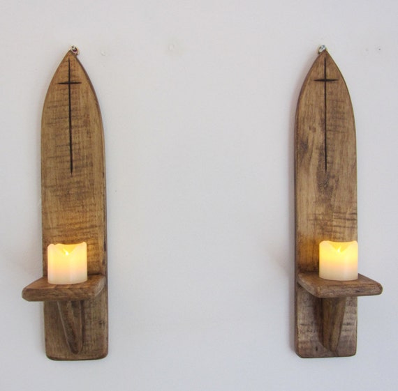 Pair of Gothic style wall sconce candle holders with carved