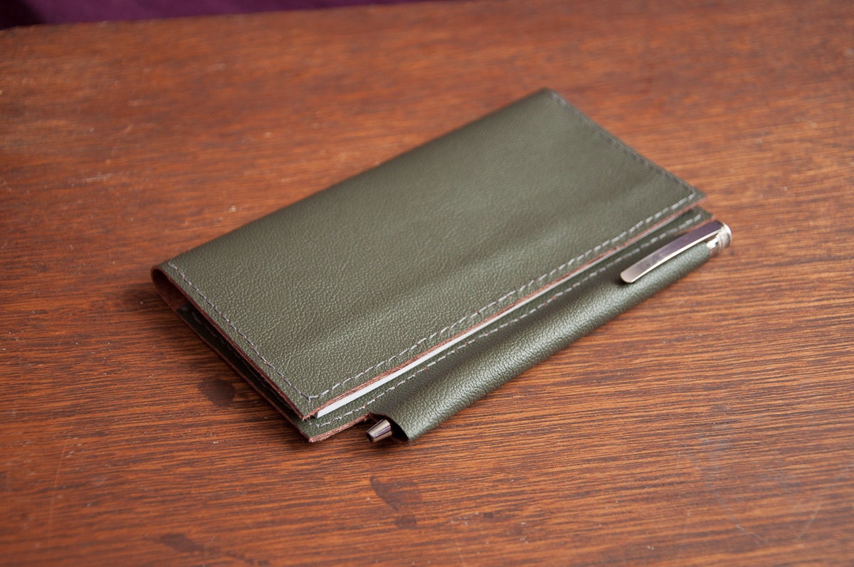 Leather checkbook cover with pen holder