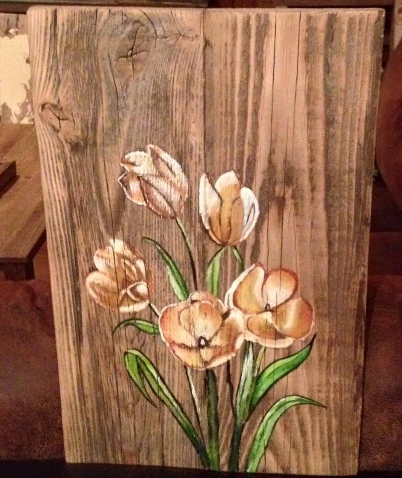 Flower painted on old wood barn