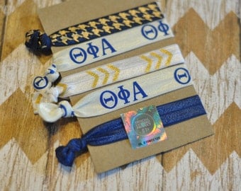 Nothing greata than goin' Theta! Theta Phi Alpha Hair Ties - Set of 5
