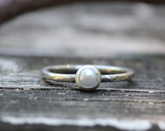 Tiny sterling silver pearl ring