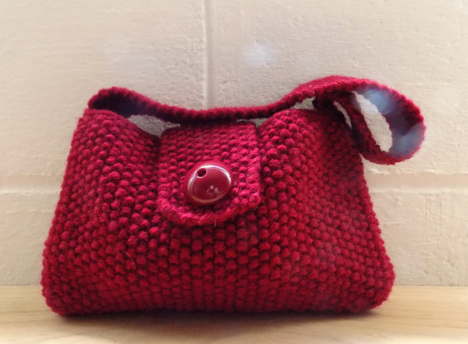 small red evening bag