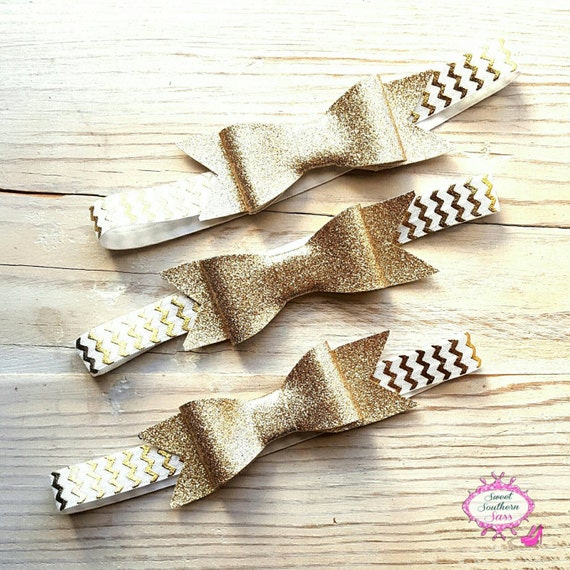 Items similar to Gold glitter bow headband, Sparkle bow headband