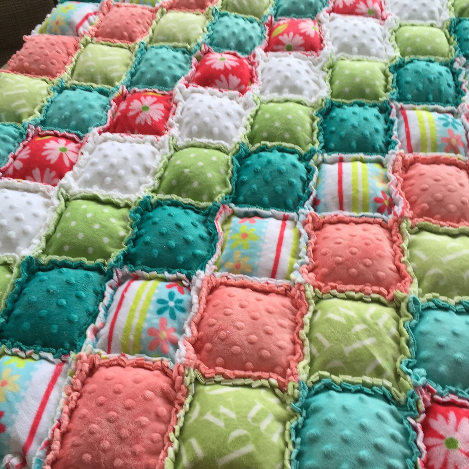 This unique puff rag quilt is done in super minky fabrics in