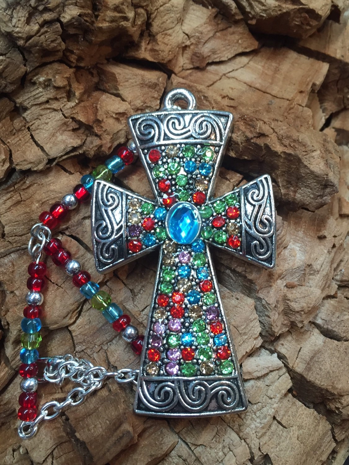 Rear view mirror charm. A cross with colored beads to hang in