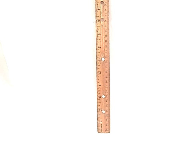 Vintage 12 inch wooden ruler with 30 mm. Useful and good looking vintage object.