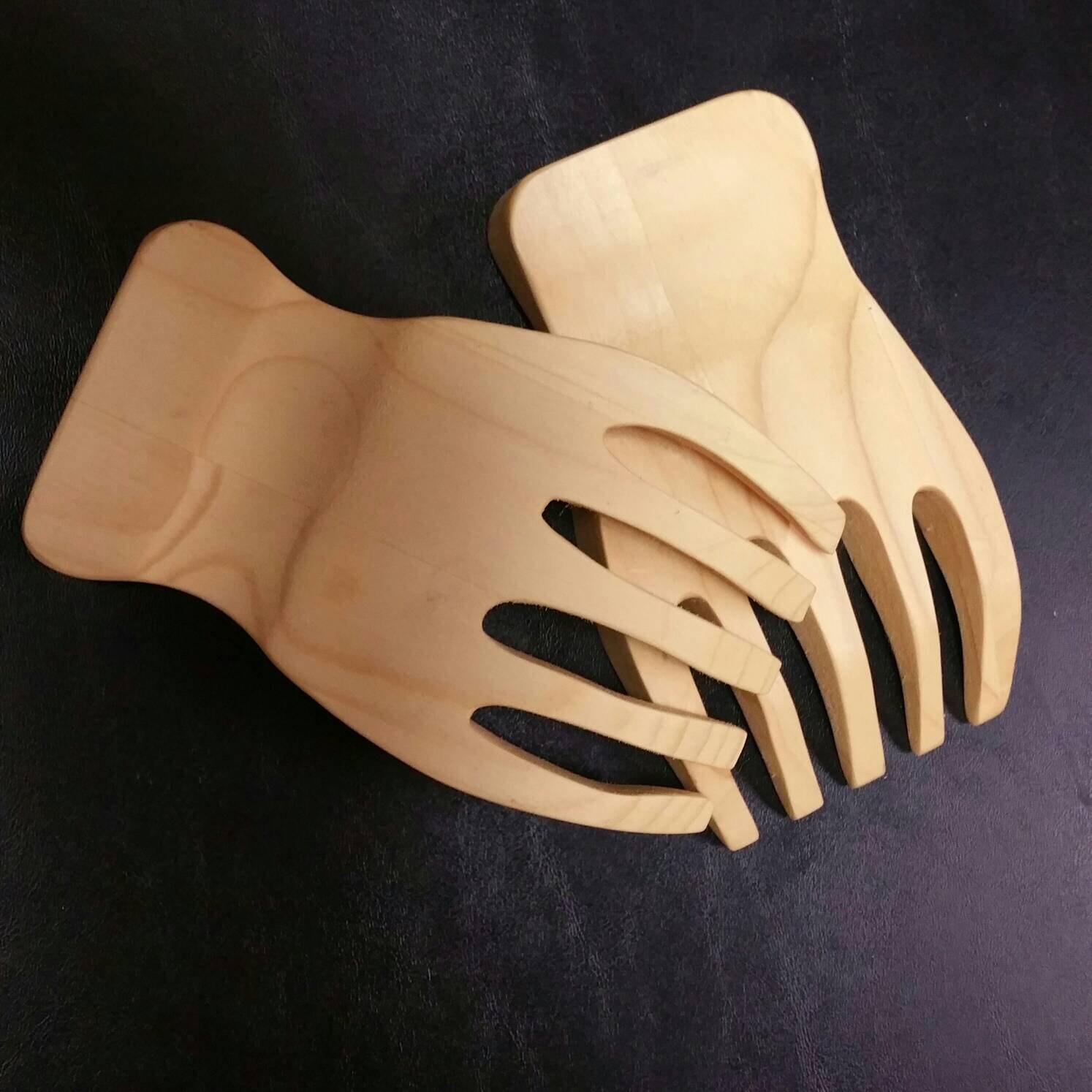 Hand made salad serving hands. Food service prepared.