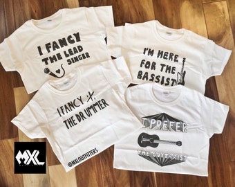 Set of 4 Band T-Shirts: I fancy the lead singer, I'm here for the bassist, I fancy the drummer, I prefer the guitarist ©